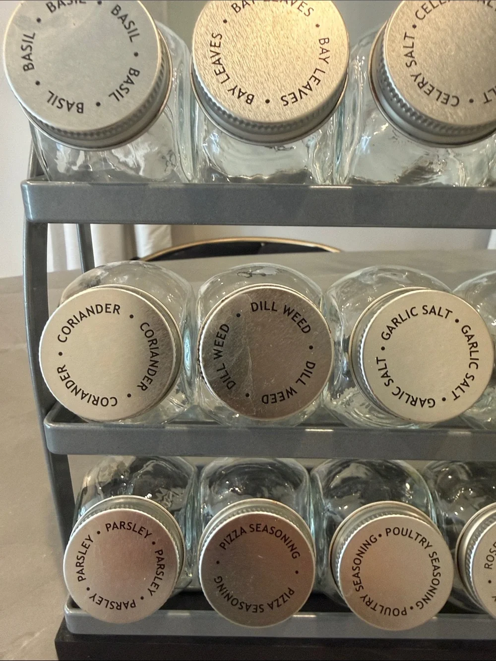 Crate&Barrel Black Spice Rack with Silver Lidded Jars